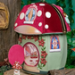 Fairy Village Toadstool House Bag by Vendula London angle